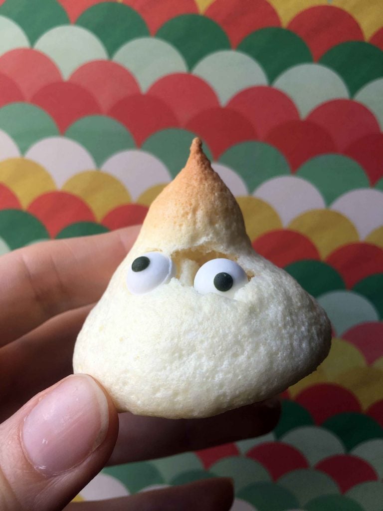 a cookie with googly eyes
