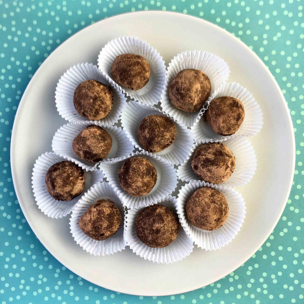 a plate of chocolate truffles