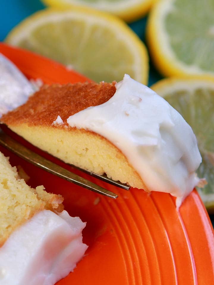 a fork holds a bite of sugar free lemon pound cake