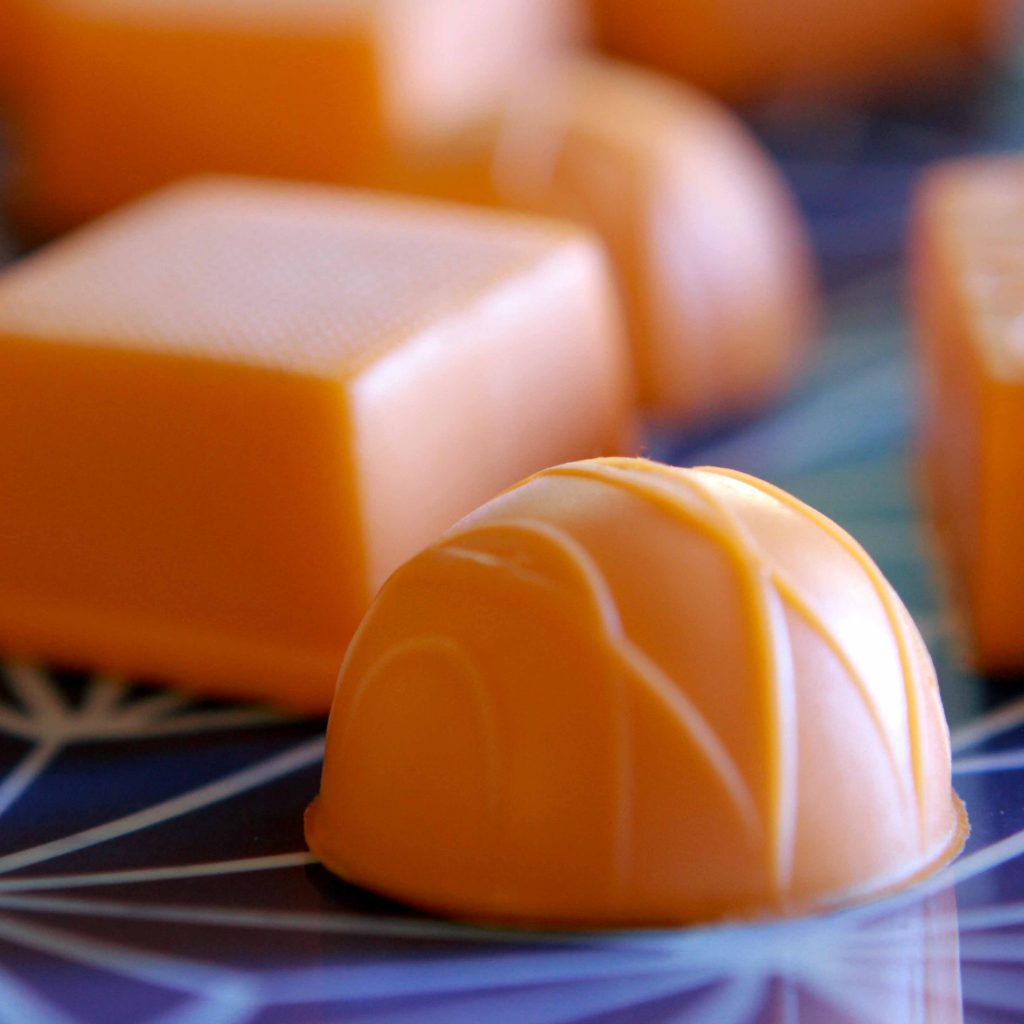 a close up on some orange gummies