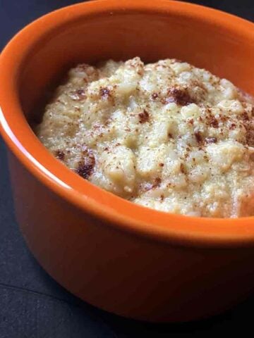 a custard cup filled with Keto Shirataki Rice Pudding