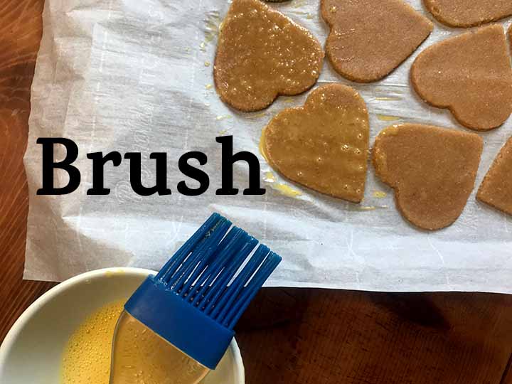 Step 8 Brush cookies with egg wash