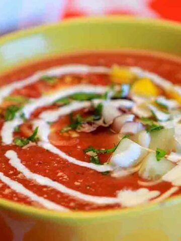 a yellow bowl of Keto Gazpacho