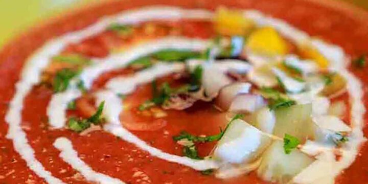 a yellow bowl of Keto Gazpacho