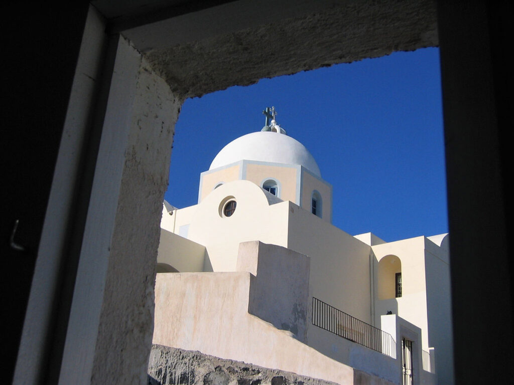 a view from a window in Santorini Greece