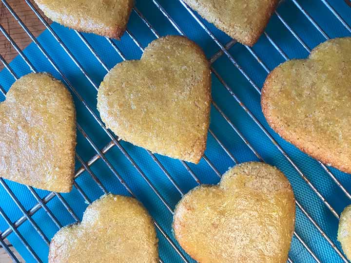 close up of some gluten free ginger cookies on a cooling rack