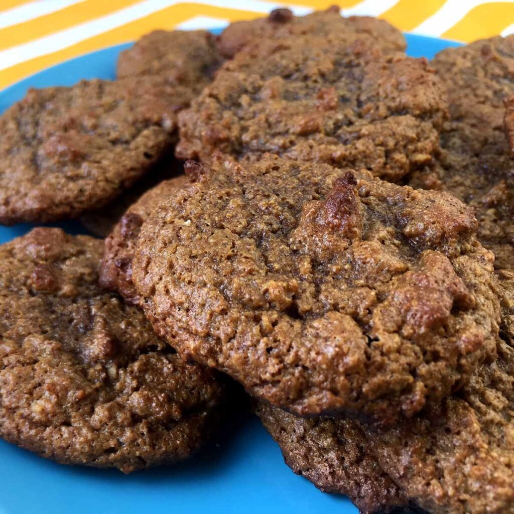 a blue plate with Keto Gingerbread Molasses Cookies