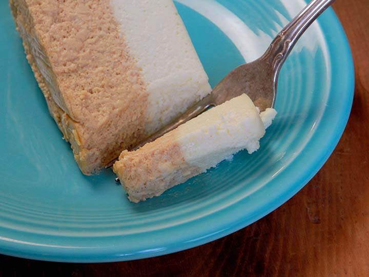 A fork picks up a bit of low carb pumpkin cheesecake