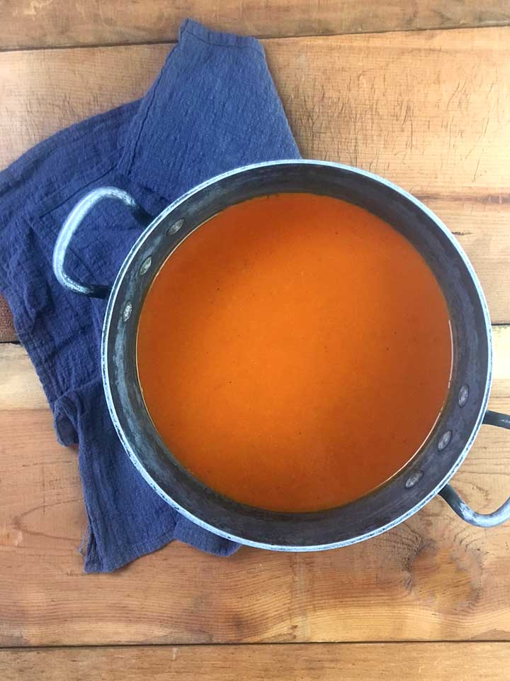 a top down view of a soup pot holding sugar-free tomato soup