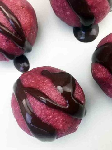 2 purple balls of Keto Marzipan