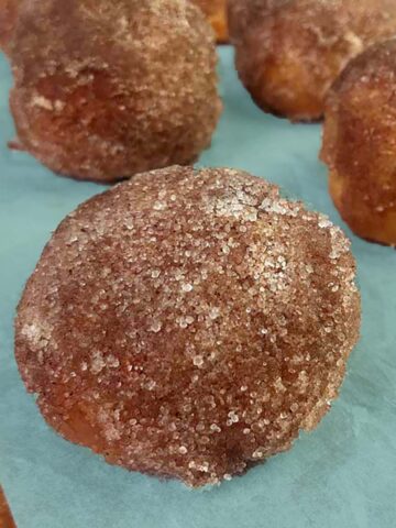 a baking sheet with keto donut holes