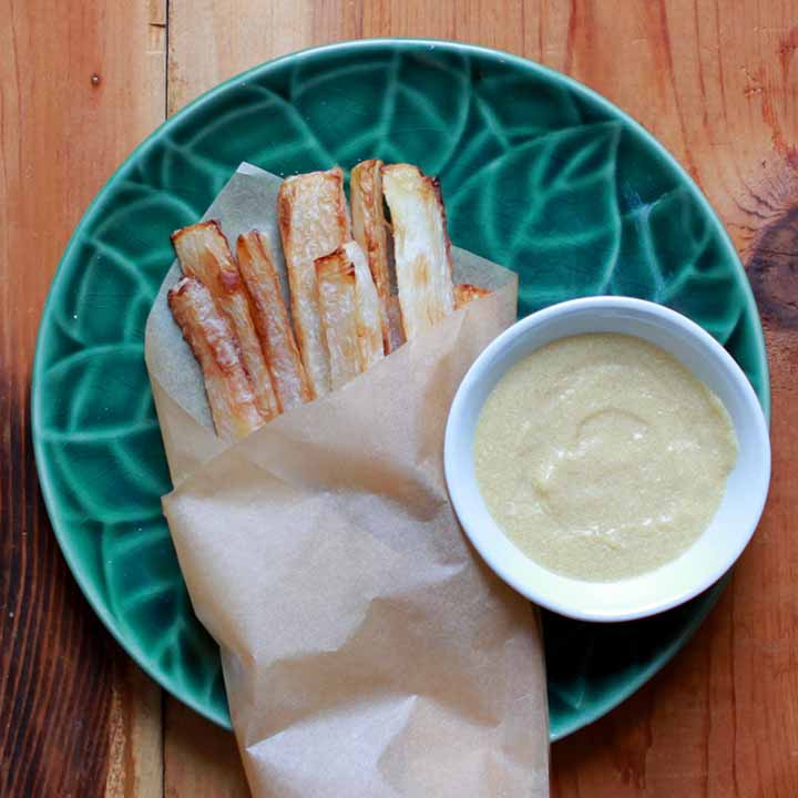 Daikon Radish French Fries on a green plate