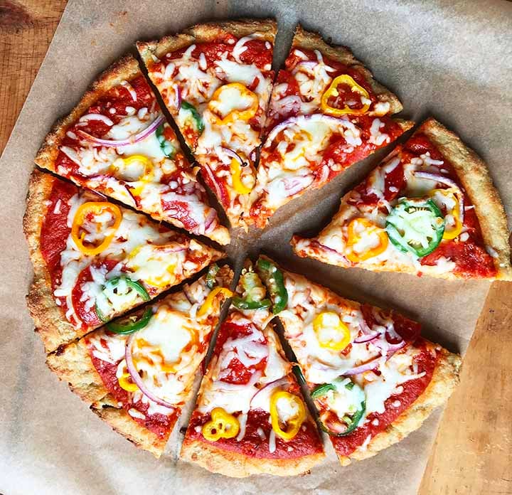 top down view of an almond flour pizza dough with yeast