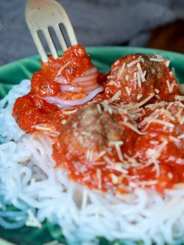 a fork twirls some Keto Spaghetti and Meatballs