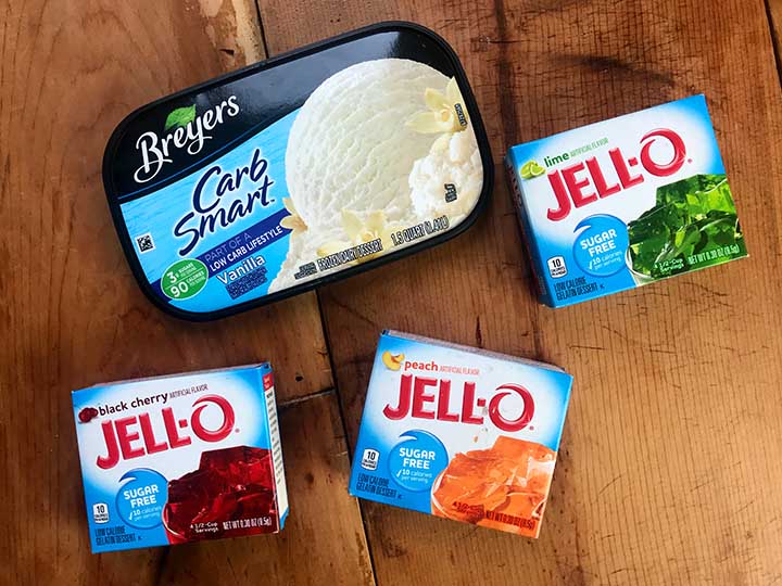 a tub of ice cream and three boxes of Jello