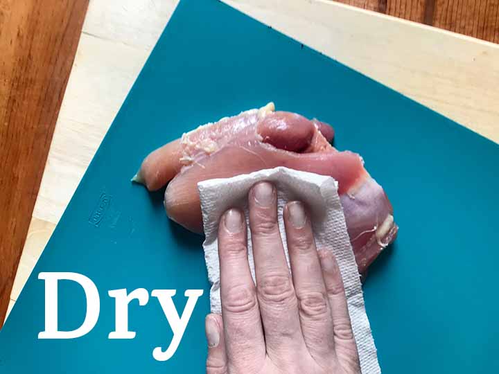 Step 1 dry off chicken thighs
