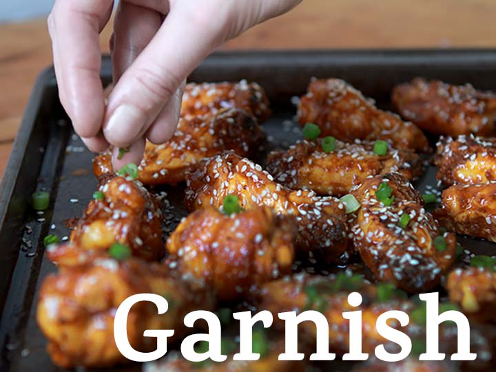 Step 7 Garnish the Sugar=Free Gluten-Free Spicy Korean Chicken wings with sesame seeds and scallions