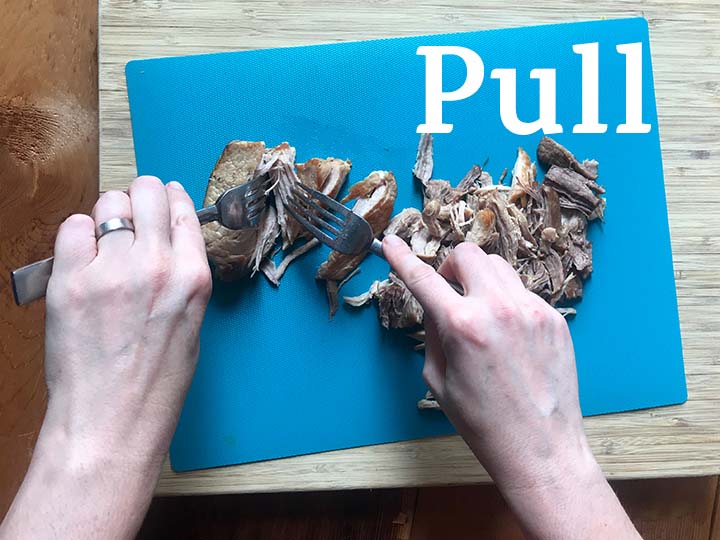 Step 7 pull the pork with 2 forks