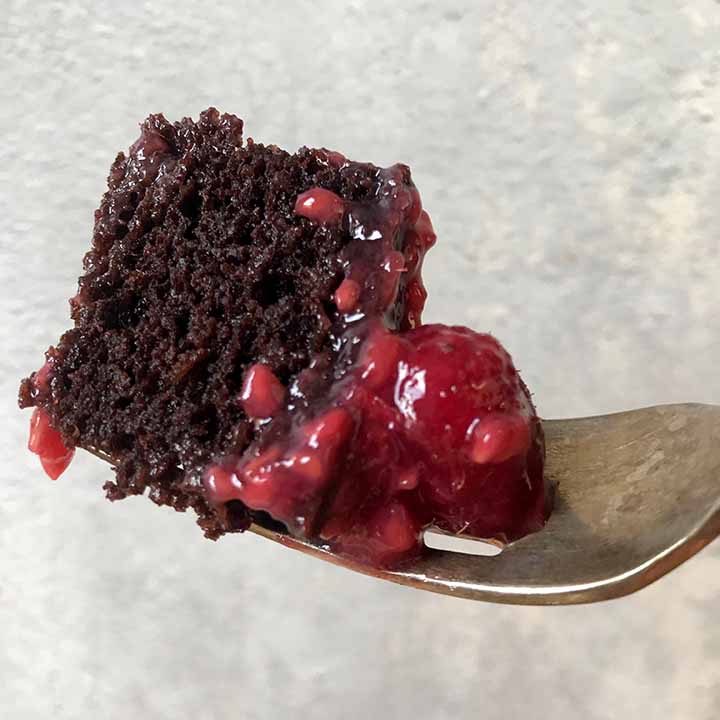 A close up of a fork holding low carb chocolate box cake