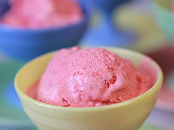 Low Carb Strawberry Frozen Yogurt in a yellow bowl