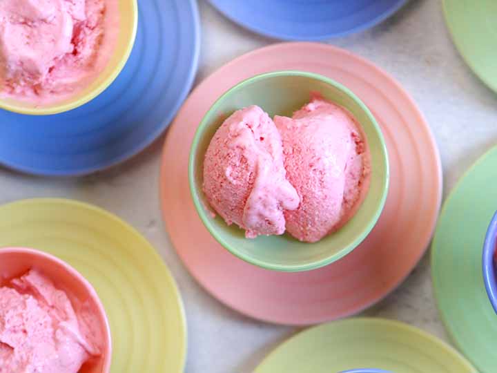 Green bowl filled with Sugar-Free Strawberry Fro Yo