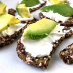 Flax Seed Crackers with cream cheese and avocado