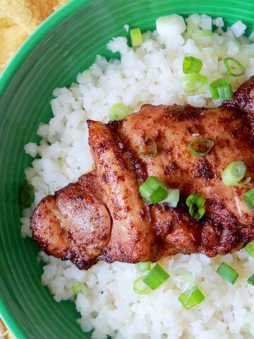 Keto Chili Lime Chicken Thighs on a bed of Cauliflower Rice