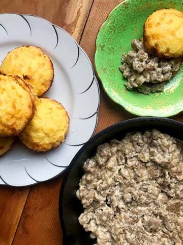 Plates of Keto Sausage Gravy and Biscuits