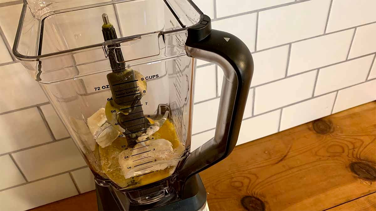 Add ingredients to a blender.