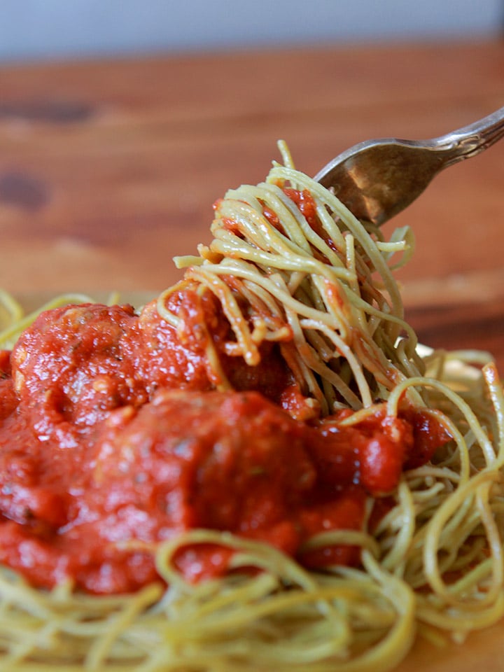 a fork twirls some Edamame Spaghetti with Meatballs