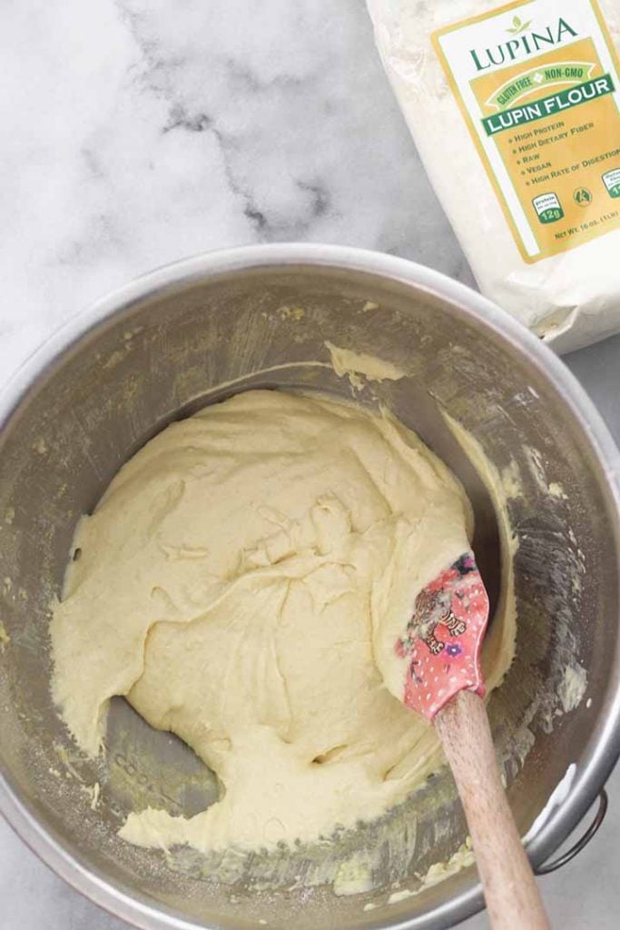 lupin flour dough being stirred with a spatula