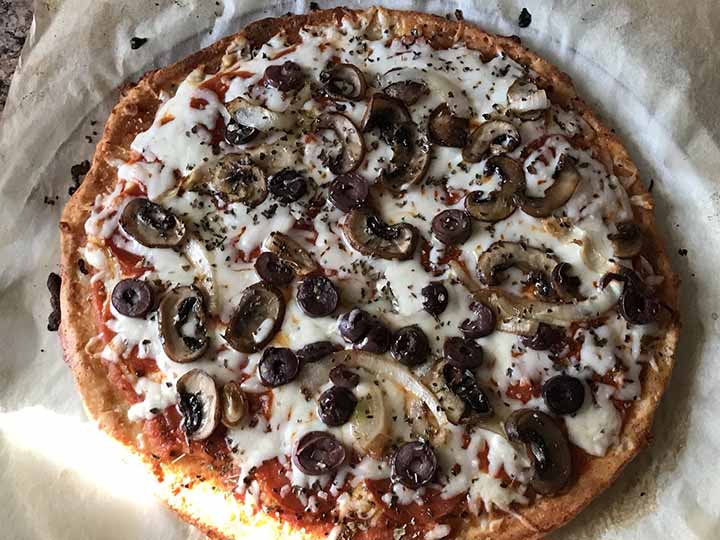 top down view of a low carb pizza made from lupin flour dough