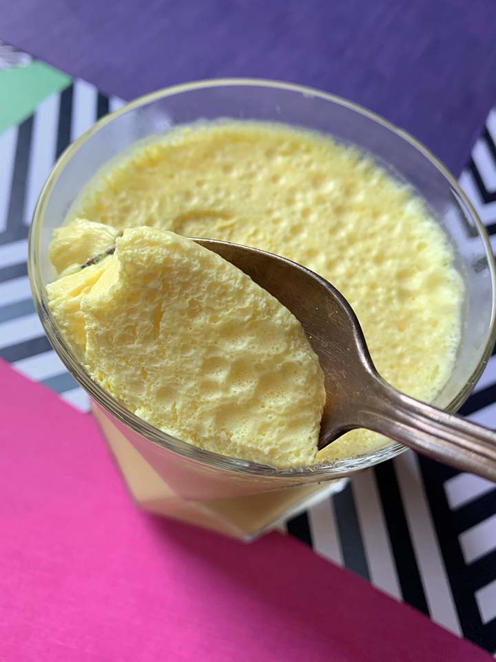 A spoon scoops up a bite of sugar free Jello whips