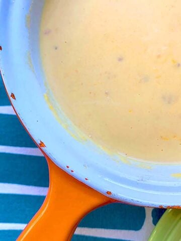 a sauce pan filled with Quick Keto Queso Sauce