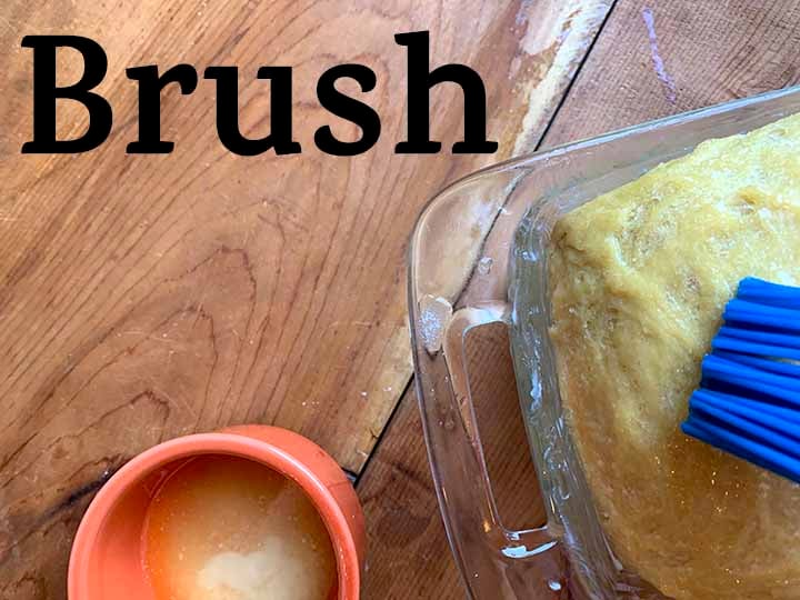 step 12 brush loaf with melted butter