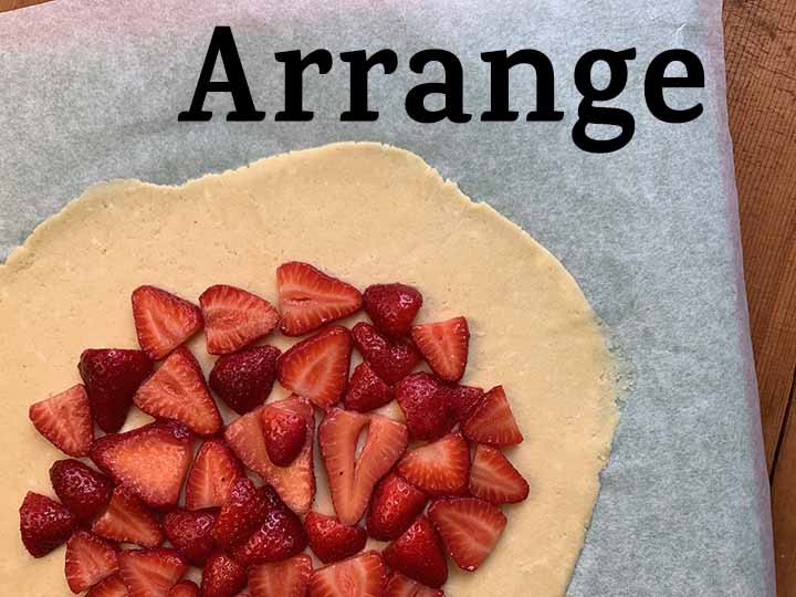 step 9 arrange the strawberries on top of the dough