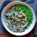 a bowl of Keto Beef Stroganoff with Green Peas