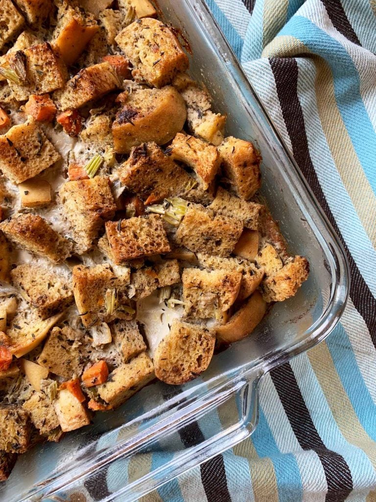 a glass casserole dish filled with low carb stuffing