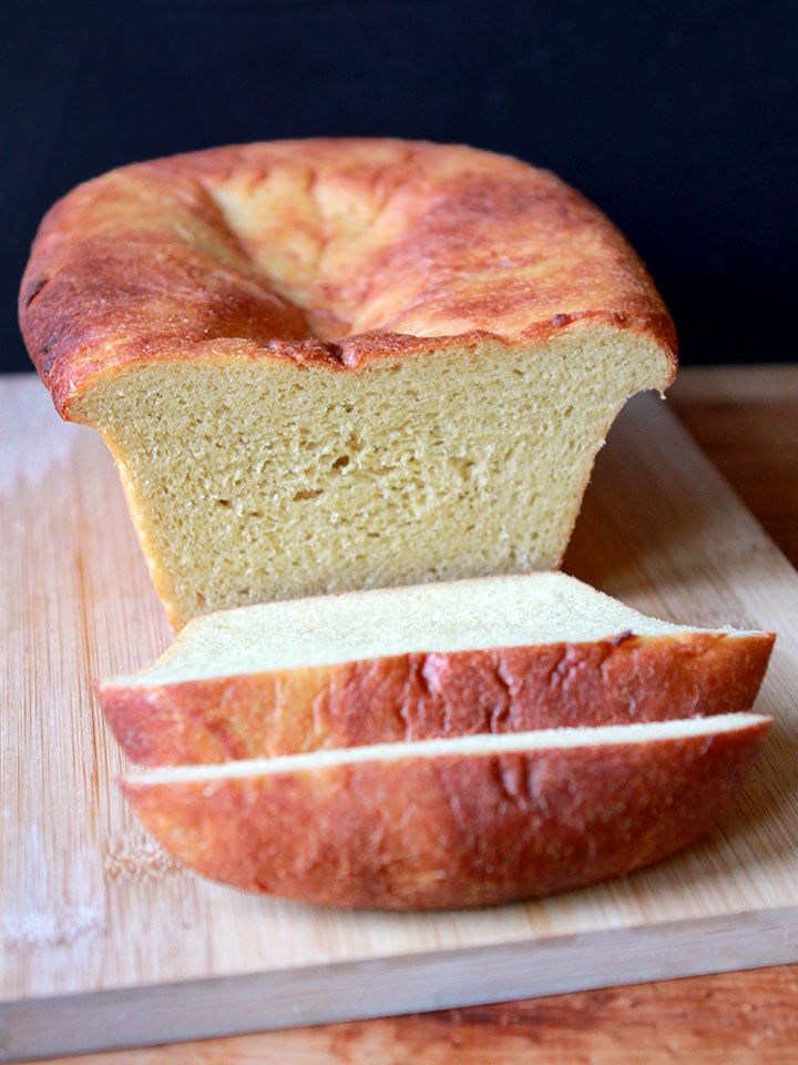 a sliced loaf of Keto yeast bread on a cutting board