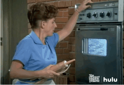 Gif of Alice from the Brady Bunch Baking