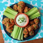 A top down view of a platter full of Keto buffalo cauliflower bites