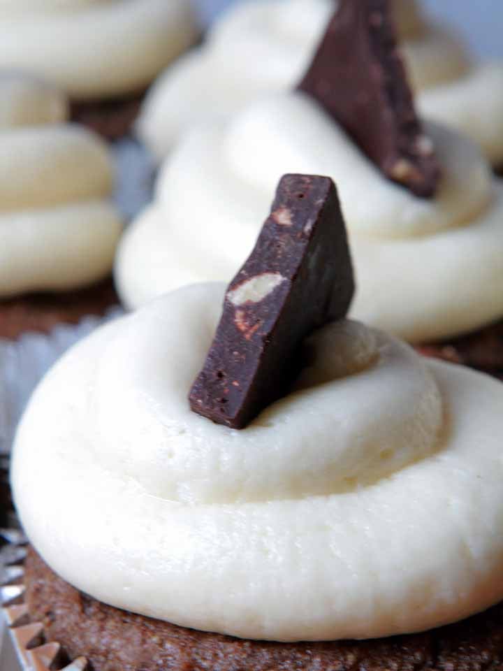 a close up of a Keto almond bark topped cupcake