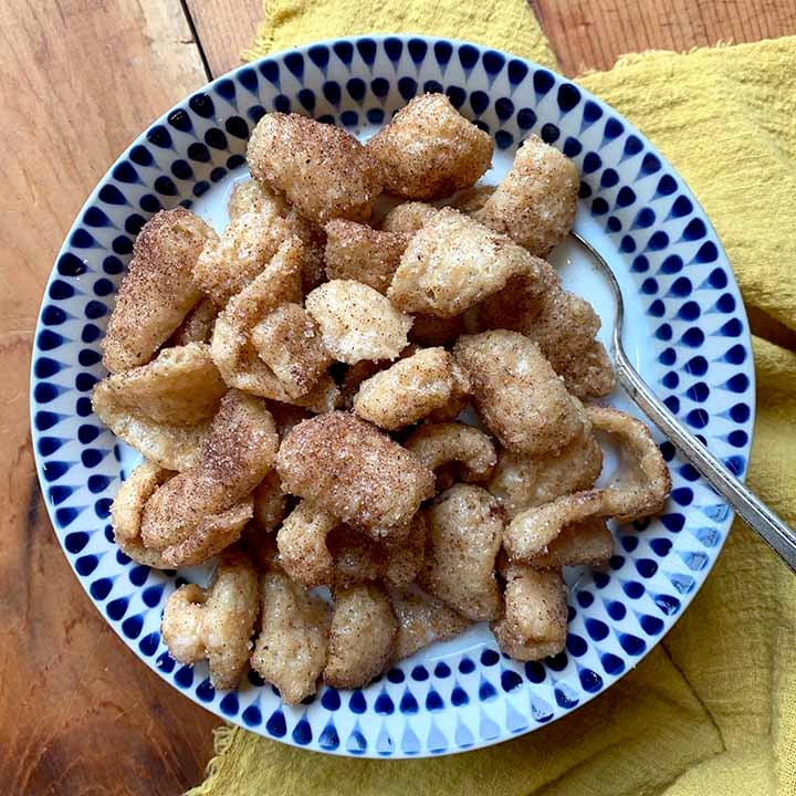 a top down picture of a bowl of low carb Cinnamon Toast Crunch cereal