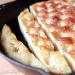 low carb yeast risen focaccia in a cast iron pan