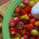 a top down view of a plate of buffalo de mozzarella salad