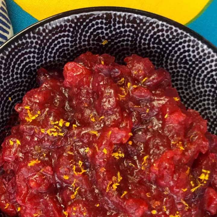 a close up of a bowl of Keto Cranberry Sauce