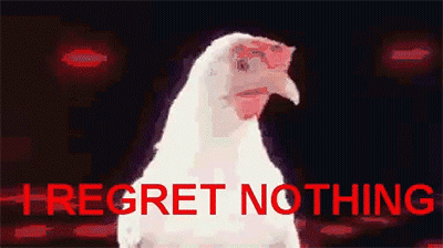 a gif of a spinning chicken that says I regret nothing