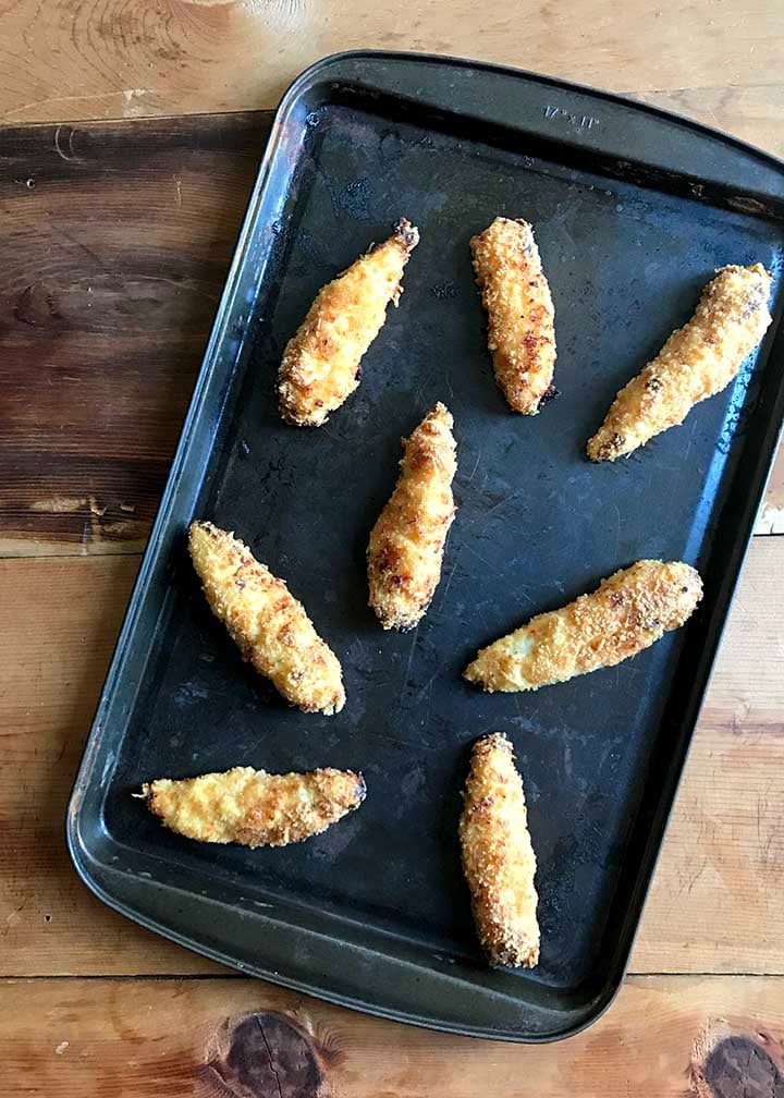 Keto Chicken Strips on a baking sheet