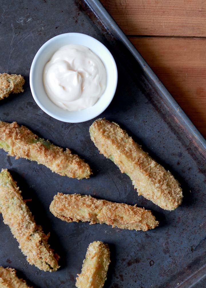 a baking sheet with Paleo Fried Pickles