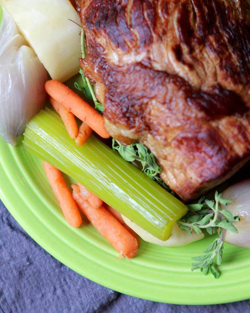 low carb vegetables and pot roast on a green platter